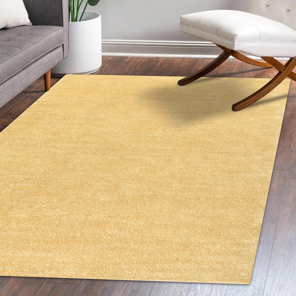 Trivor Haze Solid Low-Pile Area Rug Mustard