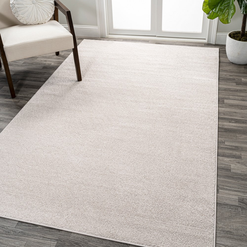 Trivor Haze Solid Low-Pile Area Rug Ivory