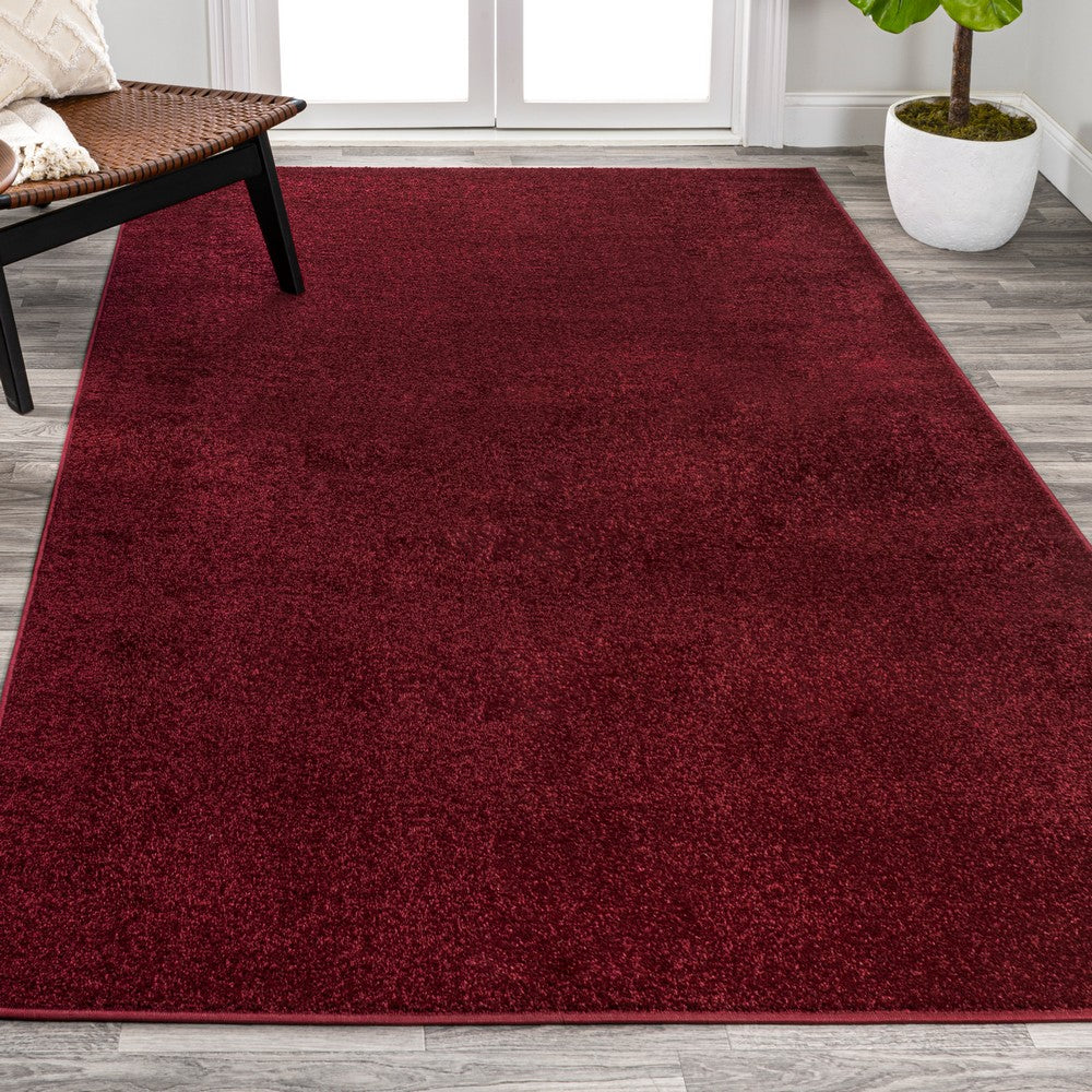 Trivor Haze Solid Low-pile Area Rug Dark Red