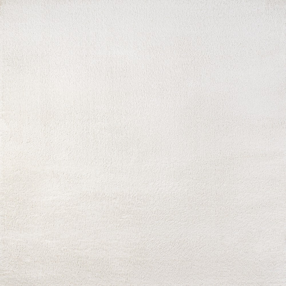 Trivor Haze Solid Low-pile Area Rug Cream