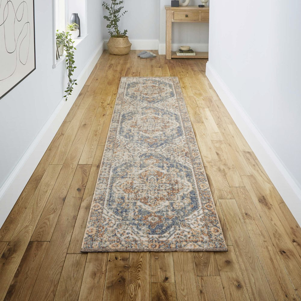 Julita Bold Distressed Medallion Low-Pile Machine-Washable Area Rug