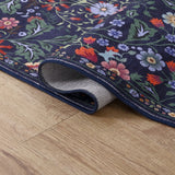 Norvyn Art Nouveau Floral Border Machine-washable Area Rug