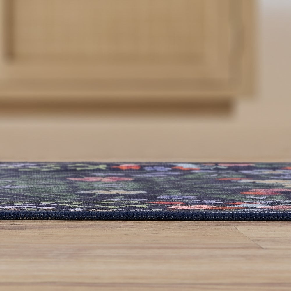 Norvyn Art Nouveau Floral Border Machine-washable Area Rug