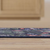 Norvyn Art Nouveau Floral Border Machine-washable Area Rug