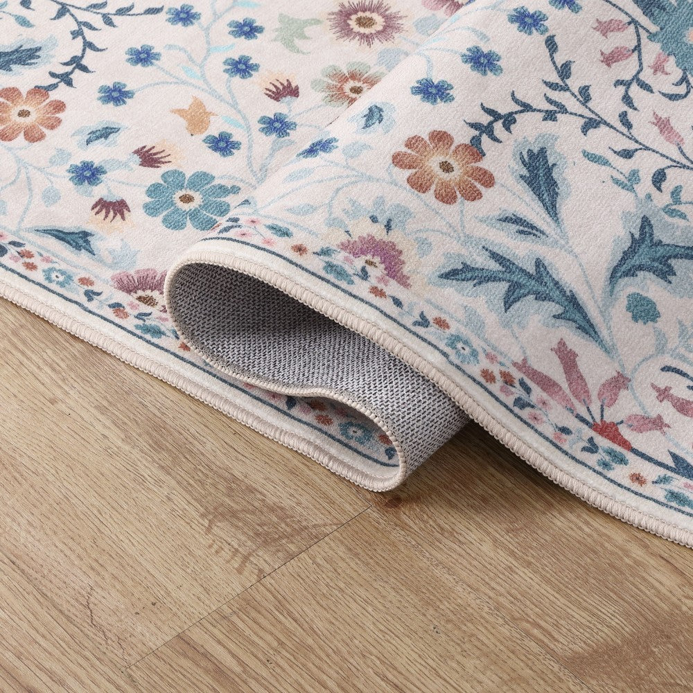Norvyn Art Nouveau Floral Border Machine-washable Area Rug