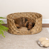 Nath 24" x 18" Classic Farmhouse Handwoven Hyacinth Oval Pet Bed with Machine-Washable Cushion