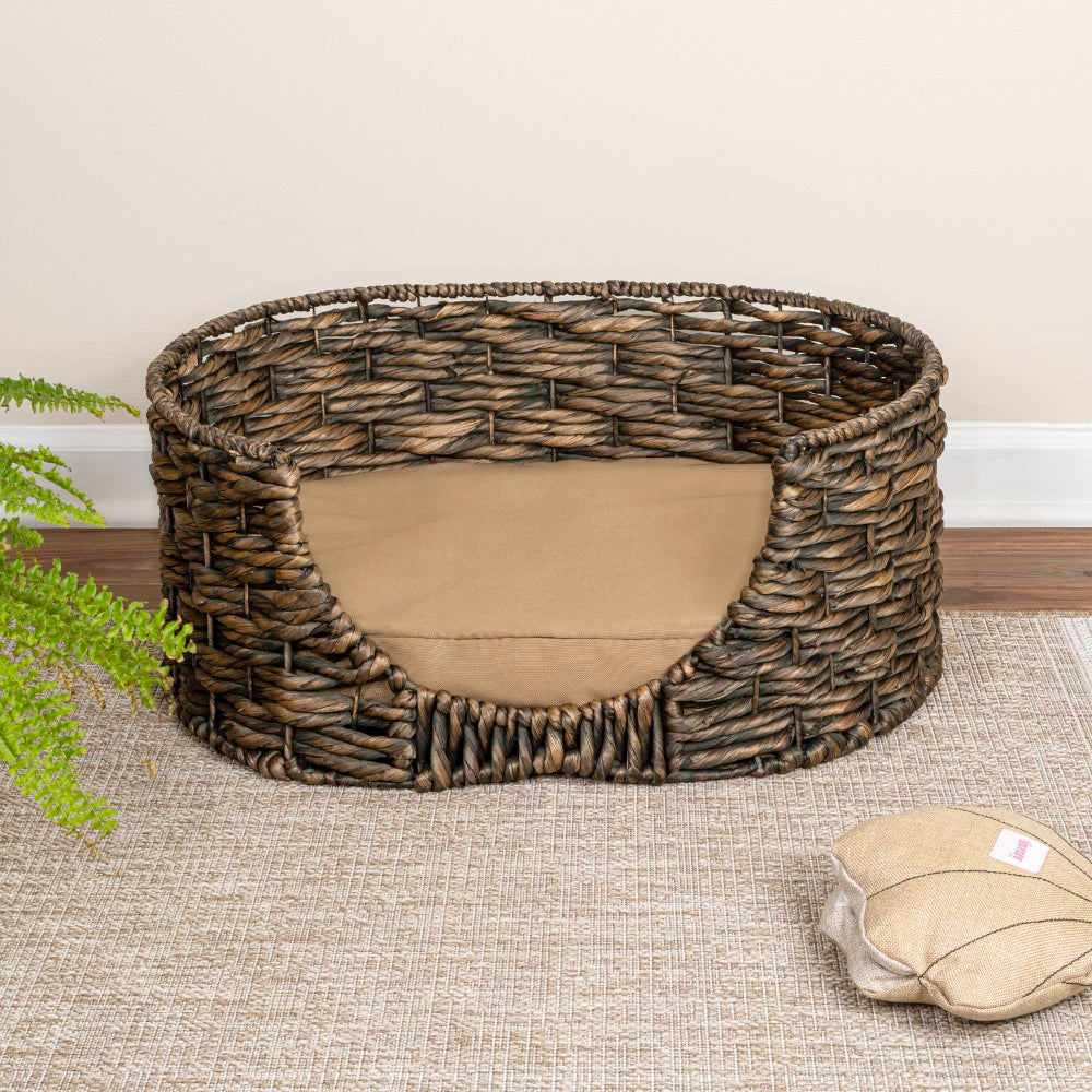 Nath 24" x 18" Classic Farmhouse Handwoven Hyacinth Oval Pet Bed with Machine-Washable Cushion