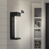 Turbo 5.13" Modern Industrial Iron/Glass Seeded Glass with Dusk-to-Dawn Sensor Integrated LED Outdoor Sconce