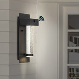 Tremillo 5.5" Minimalist Industrial Iron/Glass Seeded Glass with Dusk-to-Dawn Sensor Integrated LED Outdoor Sconce