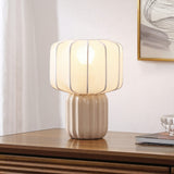 Leola 10 in. Modern Contemporary Ceramic Fluted Mini with Ribbed Cocoon Pumpkin Shade LED Table Lamp