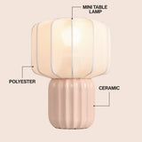 Leola 10 in. Modern Contemporary Ceramic Fluted Mini with Ribbed Cocoon Pumpkin Shade LED Table Lamp