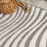 Teodor Abstract Groovy Striped Indoor/Outdoor Rug