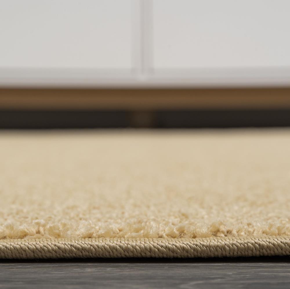 Trivor Haze Solid Low-Pile Area Rug Mustard