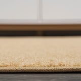 Trivor Haze Solid Low-Pile Area Rug Mustard