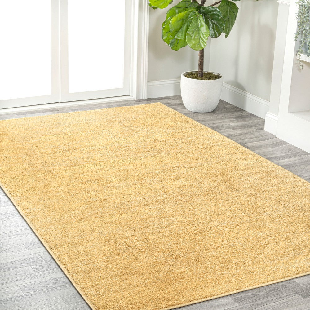 Trivor Haze Solid Low-Pile Area Rug Mustard