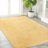 Trivor Haze Solid Low-Pile Area Rug Mustard