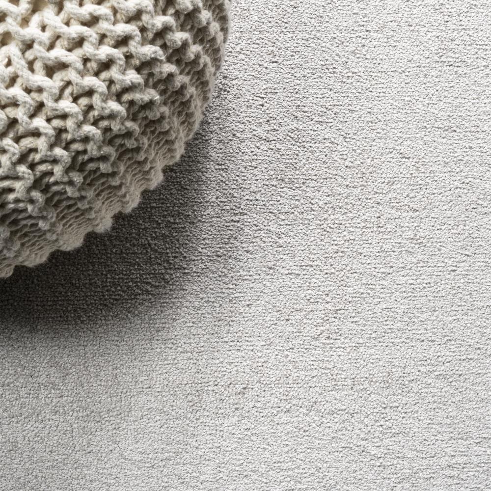 Trivor Haze Solid Low-Pile Area Rug Ivory