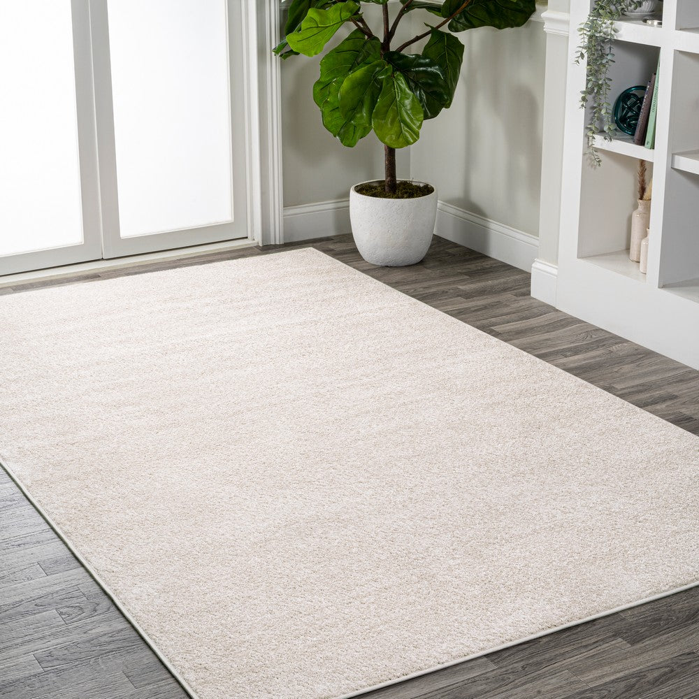 Trivor Haze Solid Low-Pile Area Rug Ivory