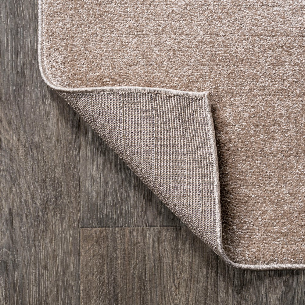 Trivor Haze Solid Low-Pile Area Rug Beige