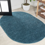 Trivor Haze Solid Low-Pile Area Rug Turquoise