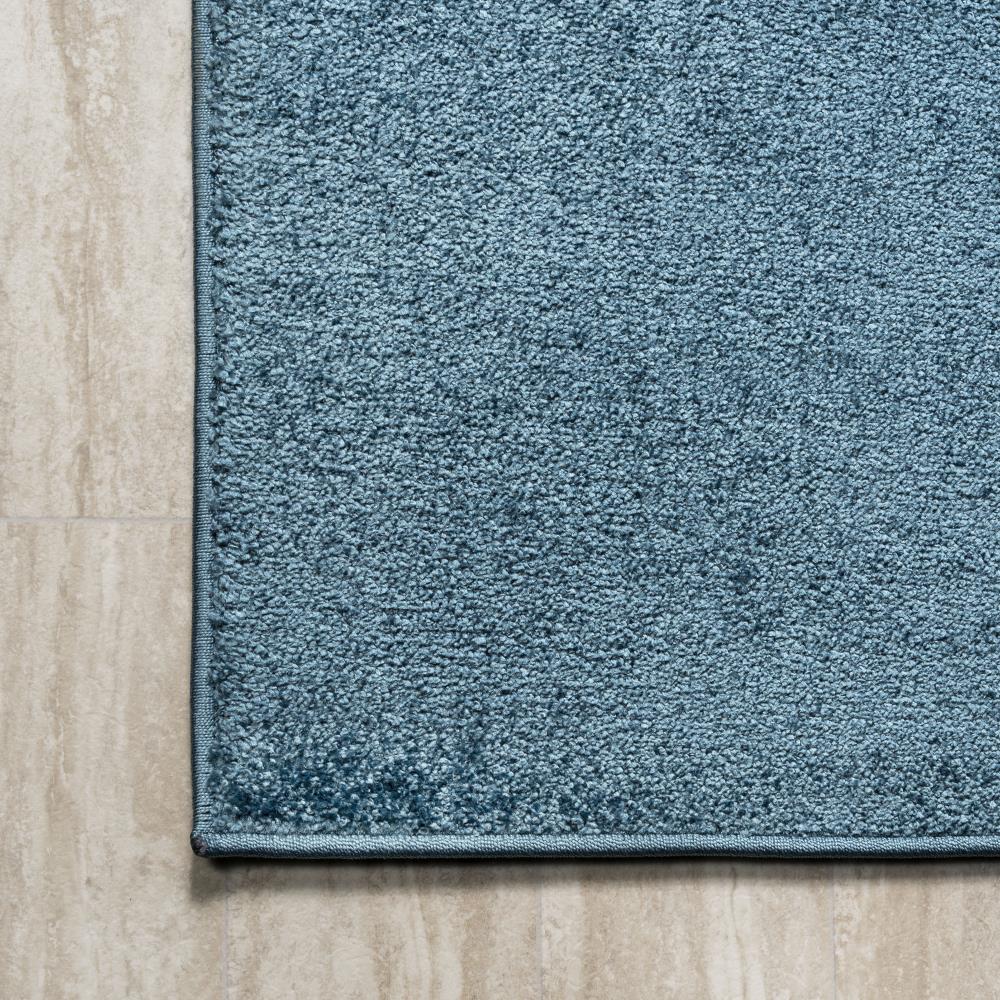 Trivor Haze Solid Low-Pile Area Rug Turquoise