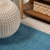 Trivor Haze Solid Low-Pile Area Rug Turquoise