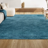 Trivor Haze Solid Low-Pile Area Rug Turquoise