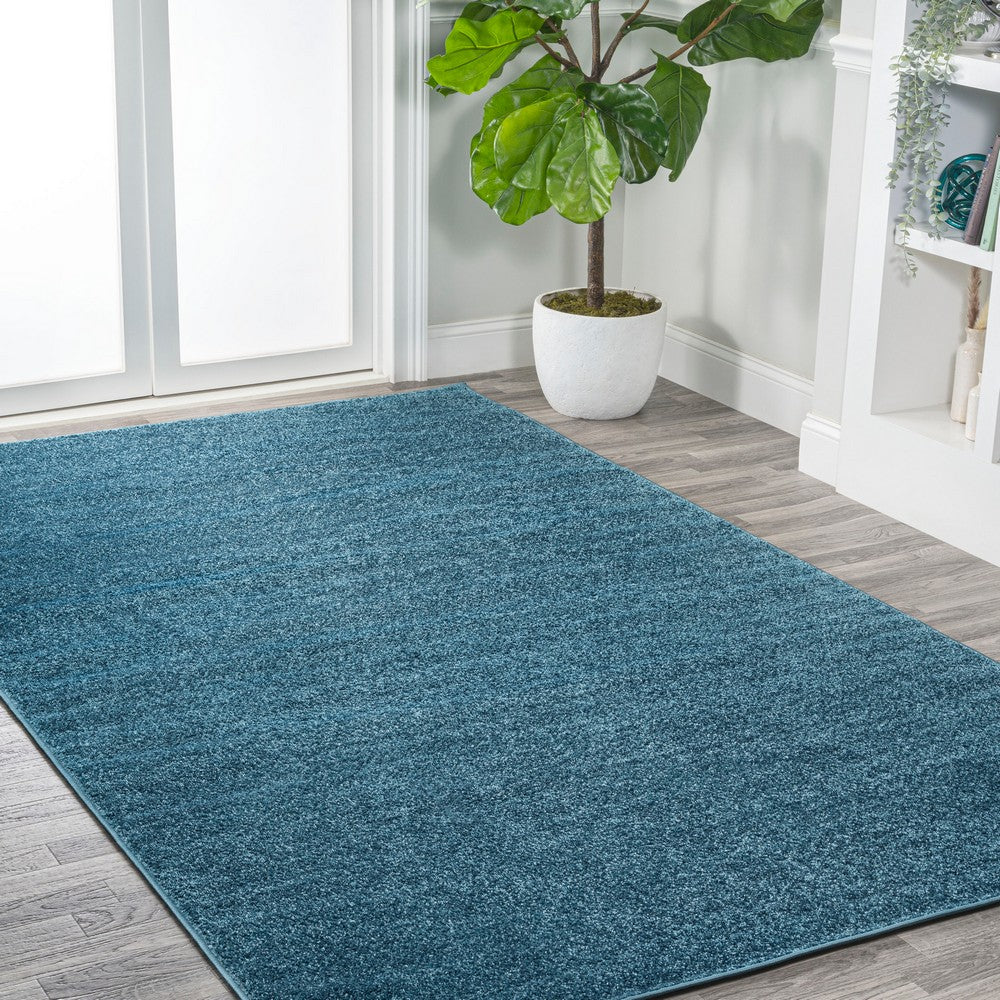 Trivor Haze Solid Low-Pile Area Rug Turquoise