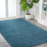 Trivor Haze Solid Low-Pile Area Rug Turquoise