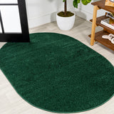 Trivor Haze Solid Low-pile Area Rug Emerald