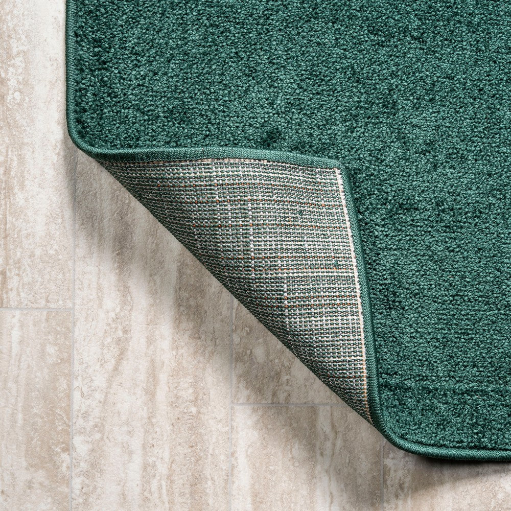 Trivor Haze Solid Low-pile Area Rug Emerald