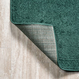 Trivor Haze Solid Low-pile Area Rug Emerald