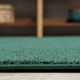 Trivor Haze Solid Low-pile Area Rug Emerald