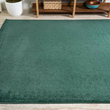 Trivor Haze Solid Low-pile Area Rug Emerald