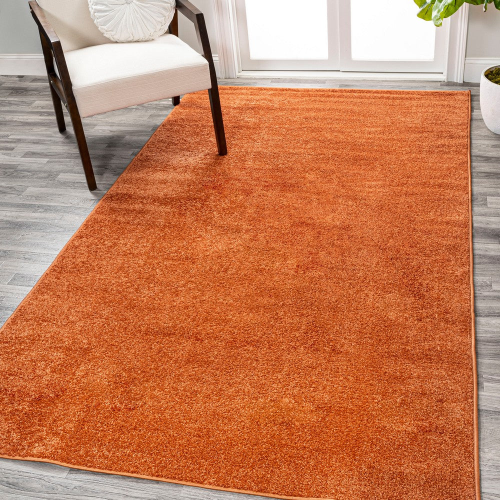 Trivor Haze Solid Low-pile Area Rug Orange