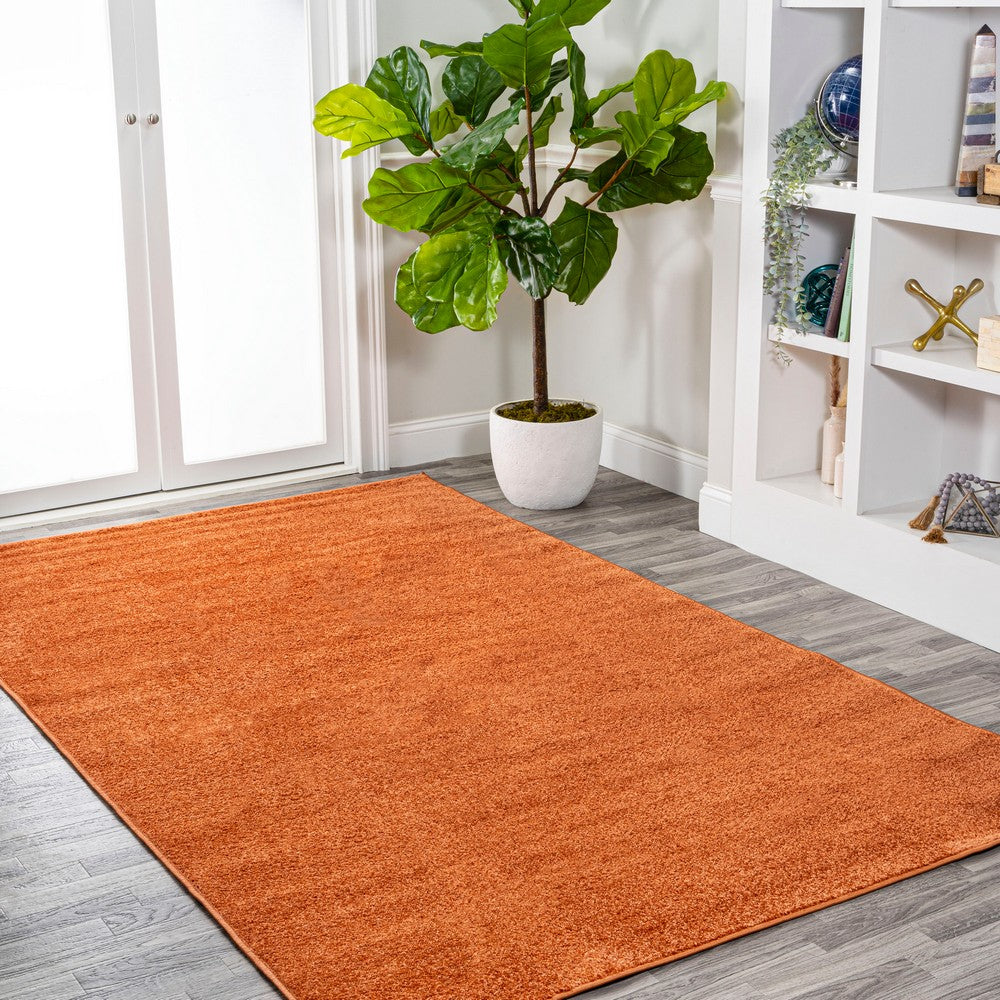 Trivor Haze Solid Low-pile Area Rug Orange