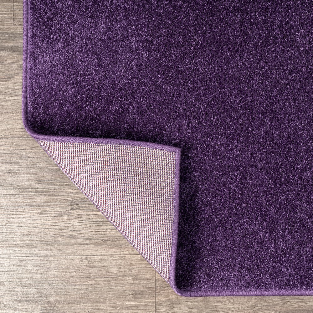 Trivor Haze Solid Low-pile Area Rug Purple