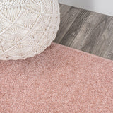 Trivor Haze Solid Low-pile Area Rug Pink