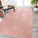 Trivor Haze Solid Low-pile Area Rug Pink