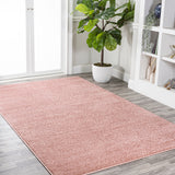 Trivor Haze Solid Low-pile Area Rug Pink