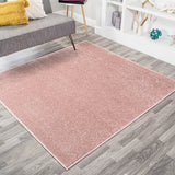Trivor Haze Solid Low-pile Area Rug Pink