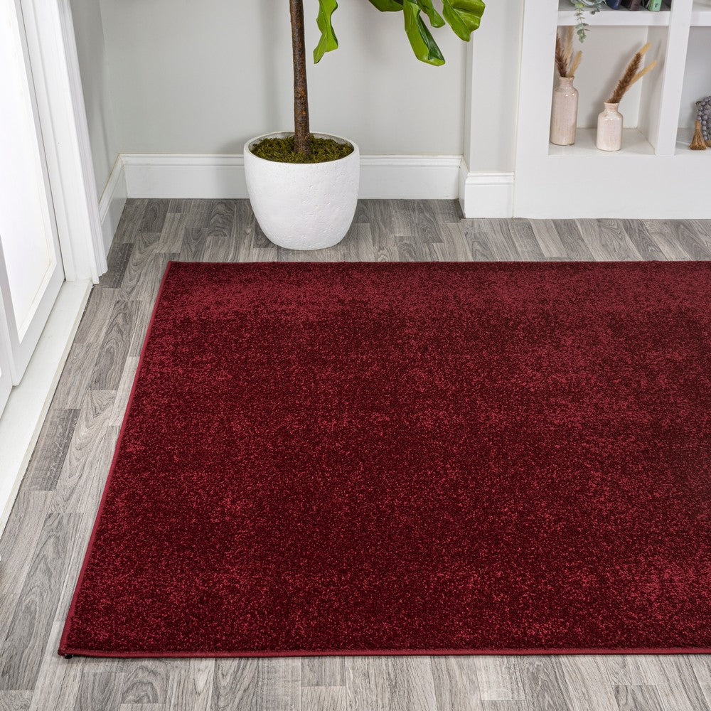 Trivor Haze Solid Low-pile Area Rug Dark Red