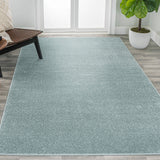 Trivor Haze Solid Low-pile Area Rug Light Blue