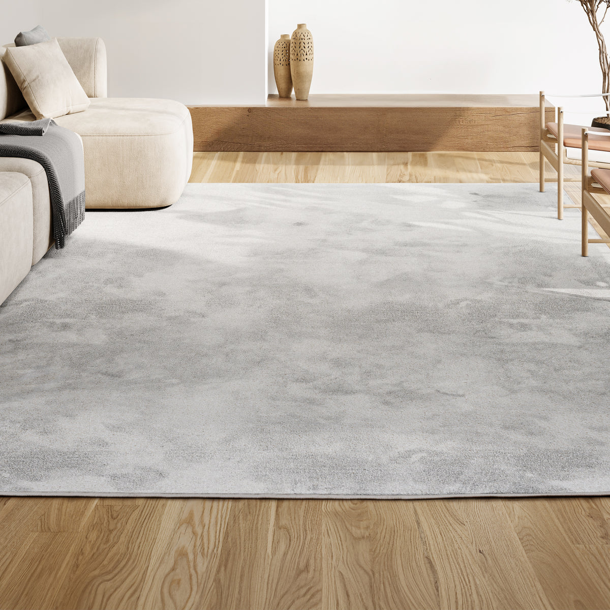 Trivor Haze Solid Low-pile Area Rug Cream