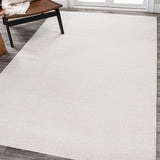 Trivor Haze Solid Low-pile Area Rug Cream