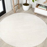 Trivor Haze Solid Low-pile Area Rug Cream