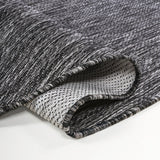 Dhiren Modern Rustic Organic Curve Indoor/Outdoor Area Rug