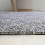 Dhiren Modern Rustic Organic Curve Indoor/Outdoor Area Rug