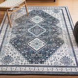 Herr Geometric Medallion Washable Area Rug