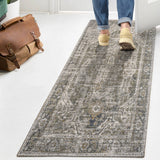 Julita Bold Distressed Medallion Low-Pile Machine-Washable Area Rug